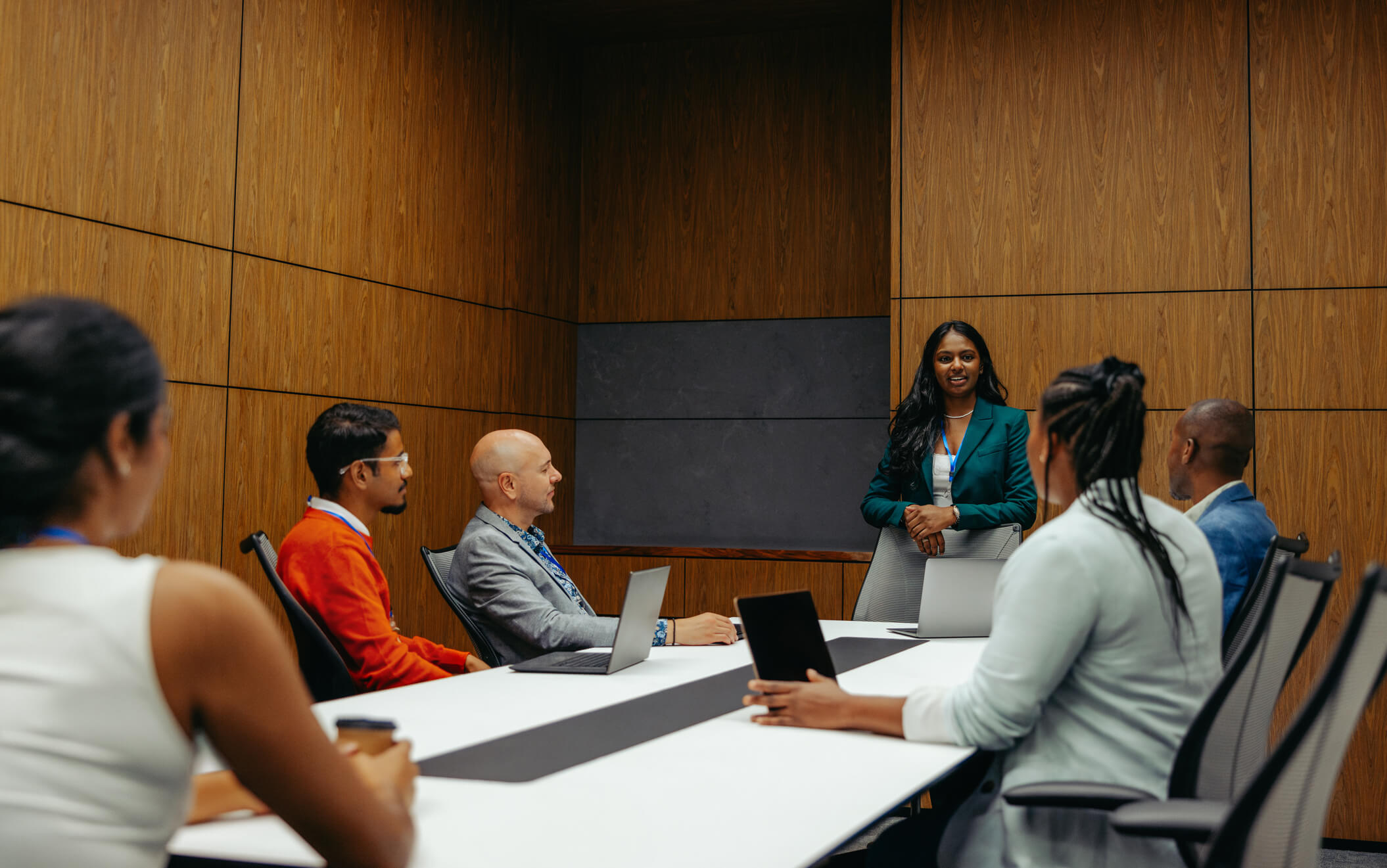 Advisory board sitting around conference table