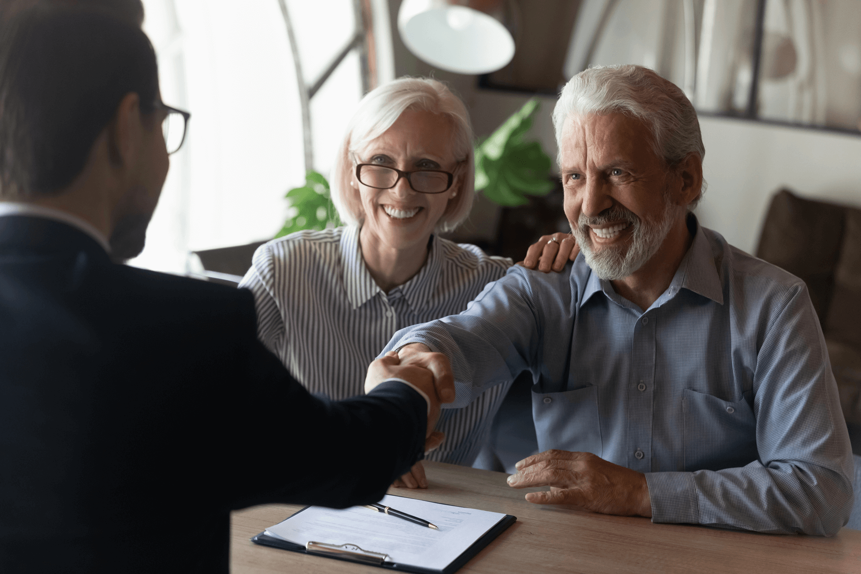 Older clients meeting with long term financial advisor